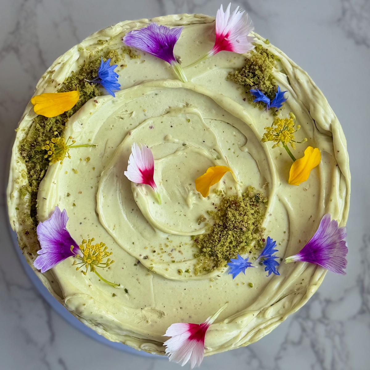Pistachio strawberry cake slice showing mascarpone filling